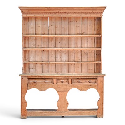 Lot 6 - A 19th century Irish stripped pine dresser,...