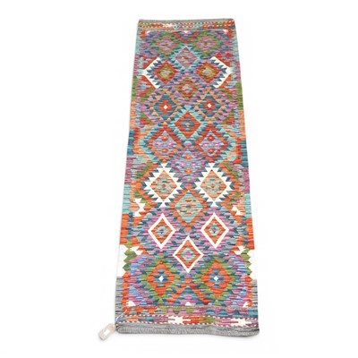 Lot 186 - A Persian kilim runner, with all over coloured...