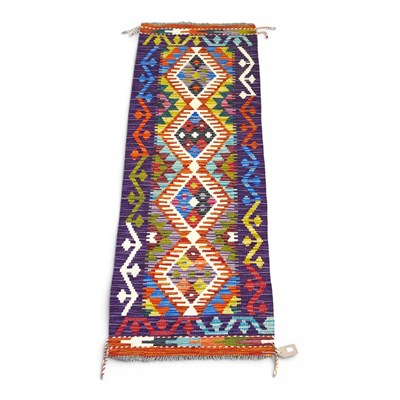 Lot 430 - A Persian kilim rug, with a row of four...