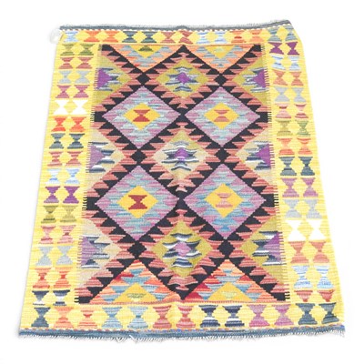 Lot 537 - A Persian kilim rug, with coloured diamonds,...