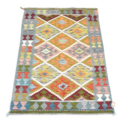 Lot 365 - A Persian kilim, with coloured diamonds, 150 x...
