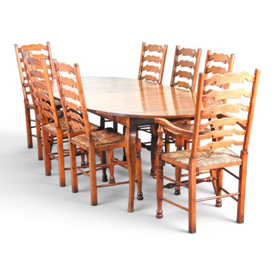 Lot 390 - A French fruitwood extending dining table, of...