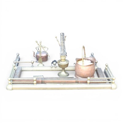 Lot 548 - A 19th century brass adjustable fender,...