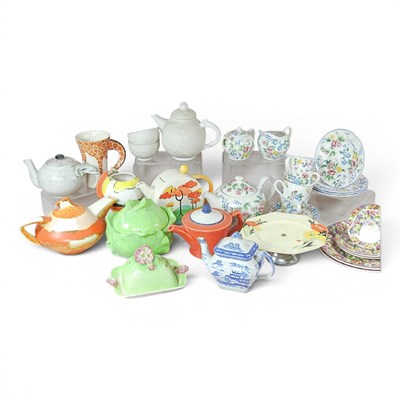 Lot 642 - A collection of novelty teapots, to include...