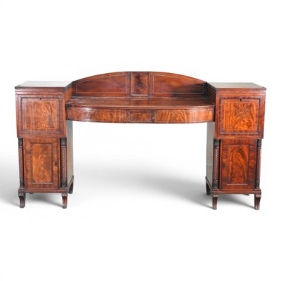 Lot 619 - A Regency mahogany pedestal sideboard, with...