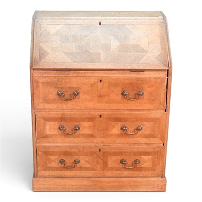 Lot 705 - An Art Deco walnut parquetry bureau, in a...