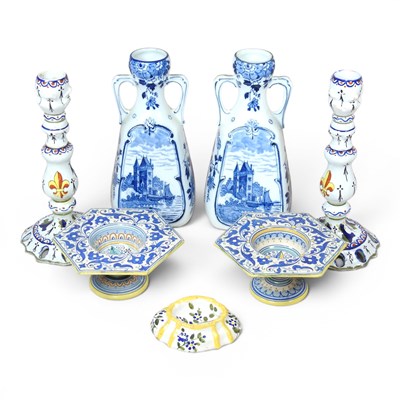Lot 175 - A pair of French faience table candlesticks,...