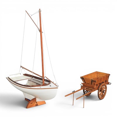 Lot 258 - A painted wooden scratch built wooden sailing...