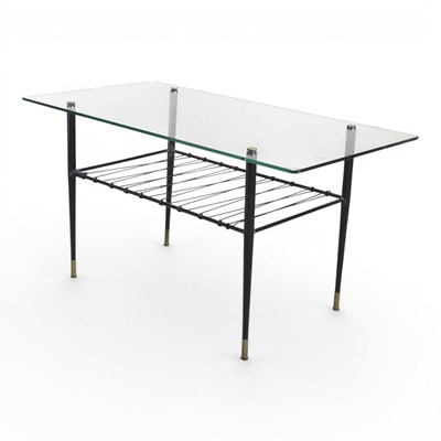 Lot 452 - A mid 20th century glass top coffee table, on...