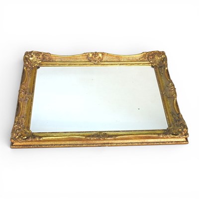 Lot 494 - An ornate 19th century gilt framed wall mirror,...