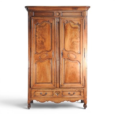Lot 336 - A large 19th century French fruitwood armoire,...