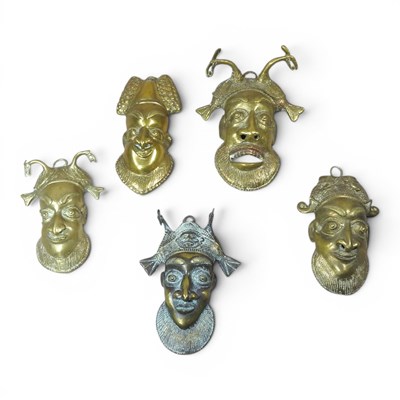 Lot 534 - An African gilt bronze mask, probably Cameroon,...