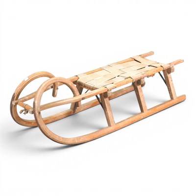 Lot 593 - A Norwegian wooden sledge, 123cm long