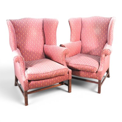 Lot 783 - A pair of Georgian style red upholstered wing...
