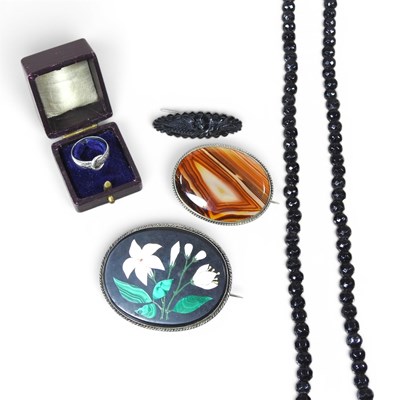 Lot 448 - A pietra dura hardstone and onyx brooch, of...