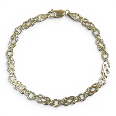 Lot 130 - A modern 9 carat gold fancy link bracelet,...