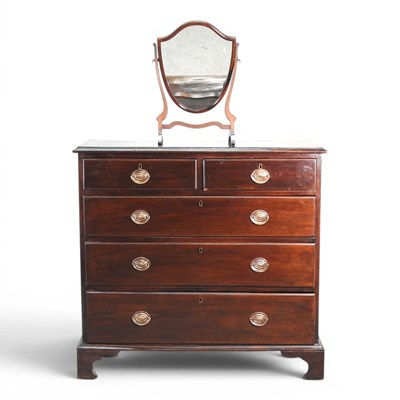 Lot 594 - An Edwardian chest of drawers, on bracket feet,...