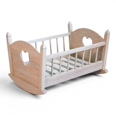 Lot 85 - A modern limed wooden cradle, with a slatted base