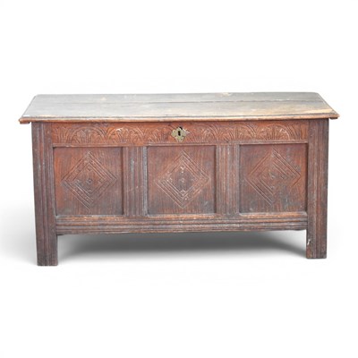 Lot 652 - An 18th century oak coffer, with a hinged lid...