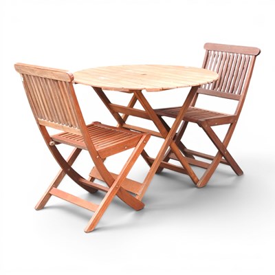 Lot 506 - A teak folding garden table, 90cm in diameter,...