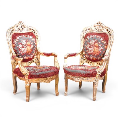 Lot 575 - A pair of continental gilt framed armchairs,...