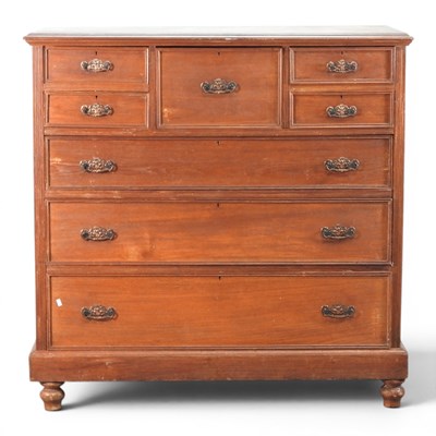 Lot 464 - An Edwardian walnut chest, containing an...