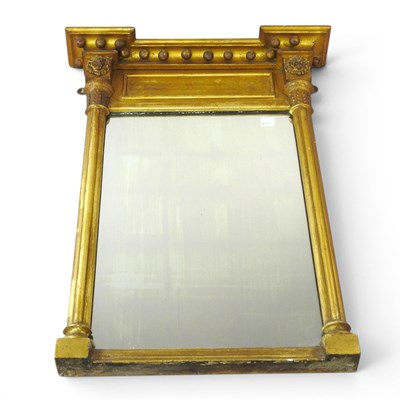 Lot 61 - A Regency gilt framed pier mirror, with ball...