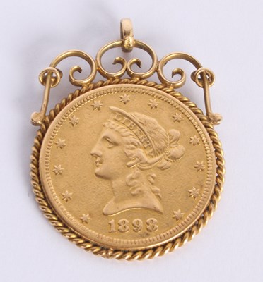 Lot 8 - A United States of America gold ten dollar...
