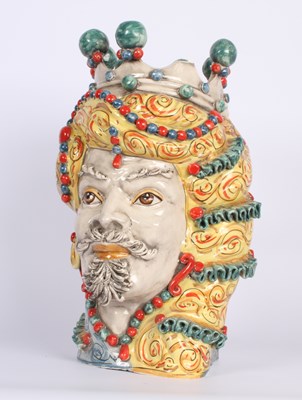 Lot 252 - A Sicilian Moor's head ceramic vase from Italy...