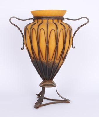 Lot 250 - A yellow glass amphora vase housed in a...