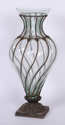 Lot 251 - A Murano style green caged blown glass urn...