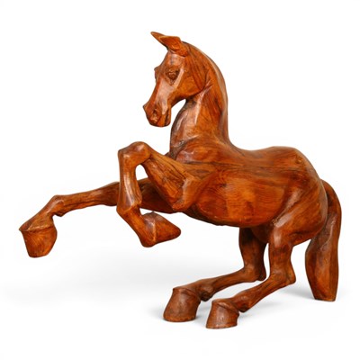 Lot 147 - A hand carved wooden horse by Nick Deans...