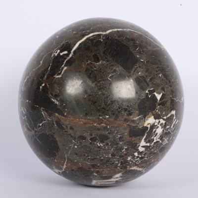 Lot 231 - A polished black marble sphere, dia. 24cm.