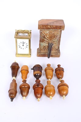 Lot 225 - A collection of pear-shaped wooden cord...
