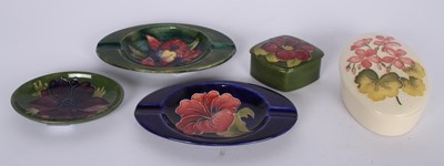 Lot 153 - A collection of five pieces of Moorcroft pottery.