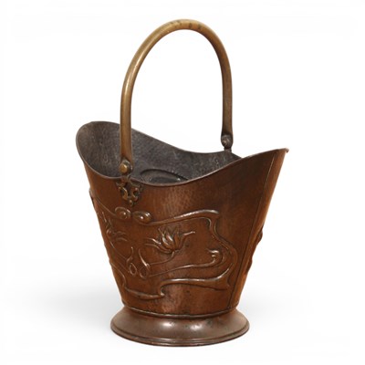 Lot 207 - An Art Nouveau copper coal scuttle, repoussé...