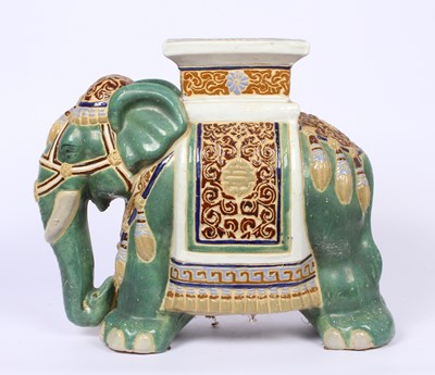 Lot 754 - A pottery stool, in the form of an elephant.
