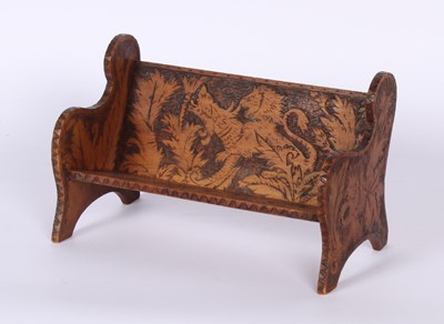 Lot 261 - An antique pokerwork decorated bookstand, 32cm...