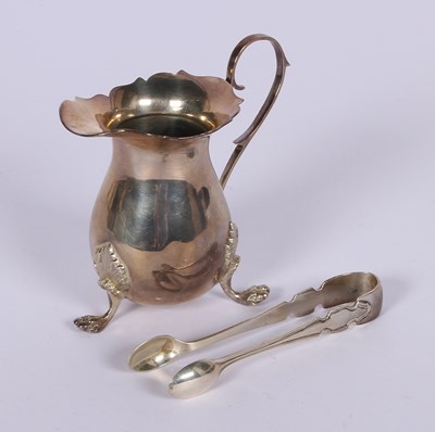 Lot 40 - An Elizabeth II silver milk jug, Birmingham...