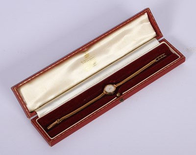 Lot 66 - A 9 carat gold Garrard bracelet watch, 20cm,...