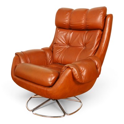 Lot 576 - A mid-century brown button upholstered lounge...