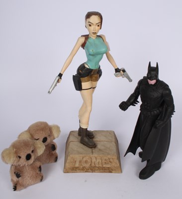Lot 728 - A collection of toys and figures, to include...
