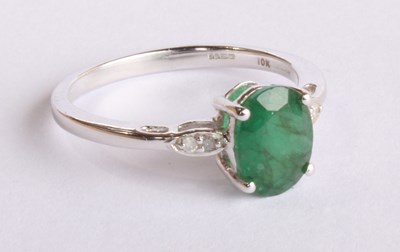 Lot 26 - A 10 carat white gold emerald and diamond ring,...