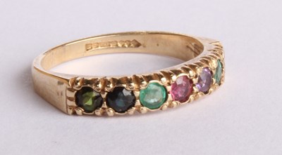 Lot 58 - A 9 carat yellow gold multi gem set dress ring,...