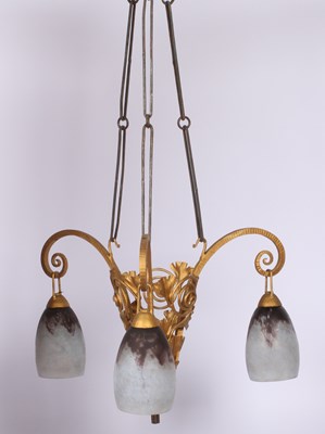 Lot 111 - An Art Nouveau gilt metal three branch...