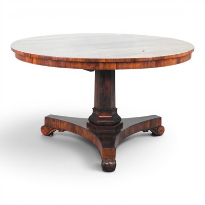 Lot 504 - A late Regency rosewood dining table, with a...
