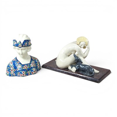 Lot 127 - A Longwy style pottery portrait bust of a lady,...