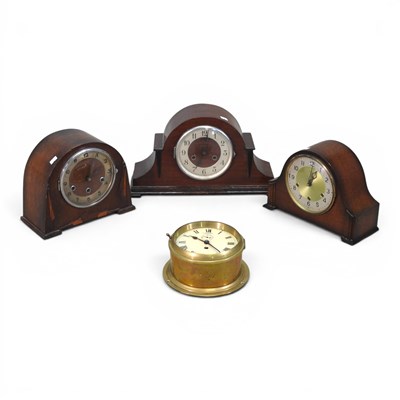 Lot 613 - A brass cased ship's clock, together with...