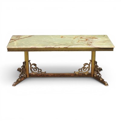 Lot 584 - A 1970s green onyx coffee table, on a gilt...