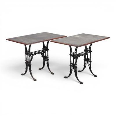 Lot 486 - A pair of side tables, each with a wooden top,...